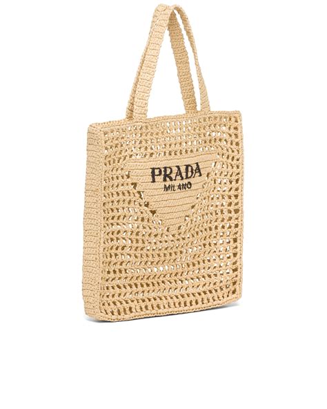 prada raffia tote.